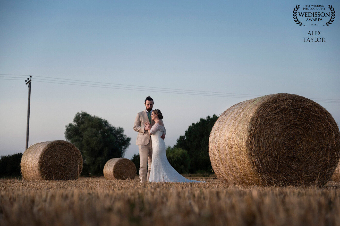 As the sun started to dip in the sky in the charming rural village of Cotton we headed out to a nearby field for a peaceful moment to catch the last of the rays amongst the hay bales.