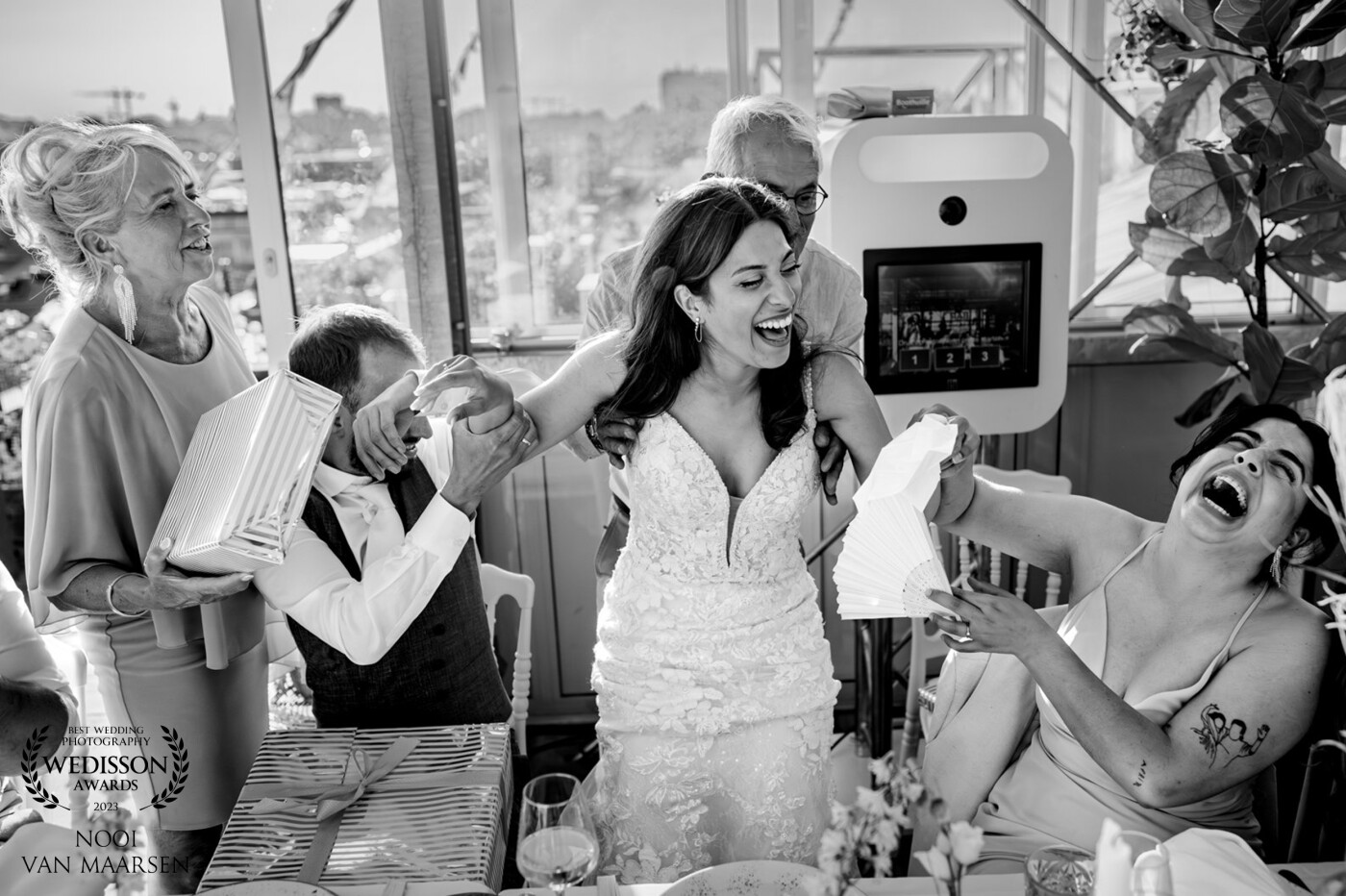 I will never forget this moment. Don't ask me why but the bride and groom were opening the presents that the parents of the groom gave them and out of the blue the bride just randomly fell of her chair. She and her friend couldn't stop laughing. It was a moment to remember.