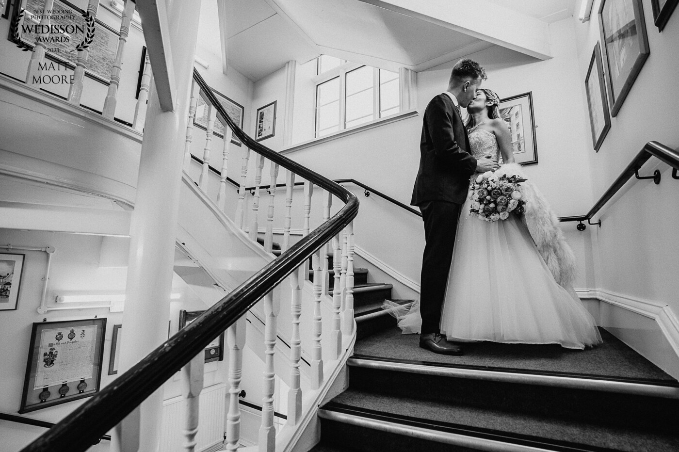 Joesph and Monica rocking the staircase at a local registry office wedding