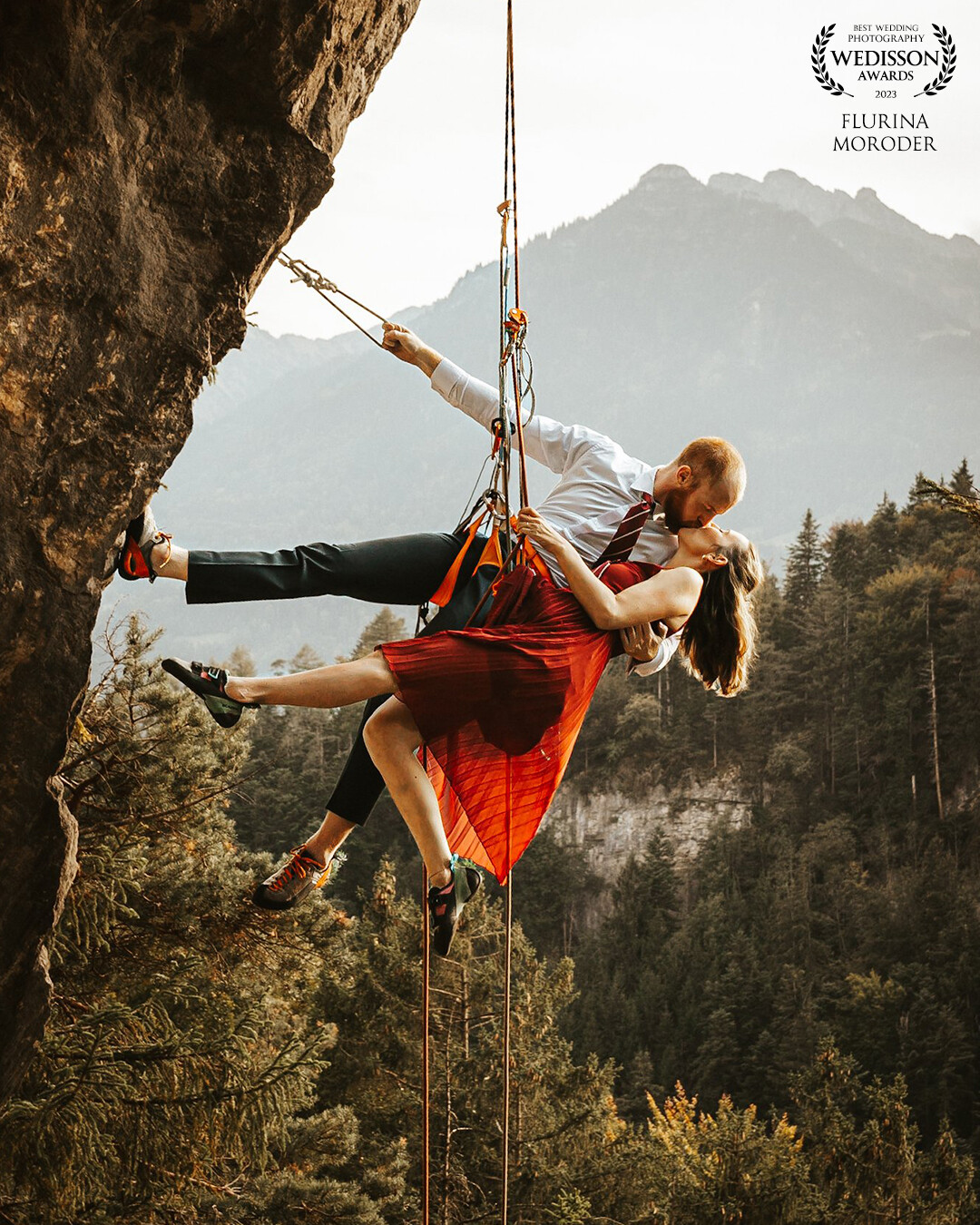 This engagement photo captures the essence of this couples love – a union forged in the mountains, where every peak climbed becomes a shared triumph and every challenge conquered strengthens the bond between these two adventurous souls as they embark on the journey of a lifetime together.