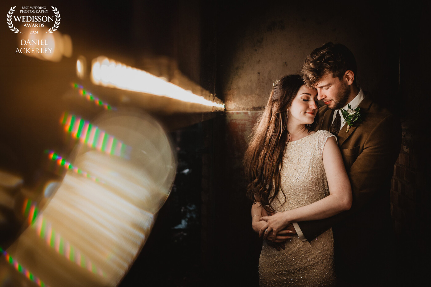 I had noticed that the venue had an outside metal chimney that was lit up internally with led strips, so I asked Ed & Lizzie to stand inside it while I used a prism to create a little light refraction effect, it worked really well and they had a lovely moment.