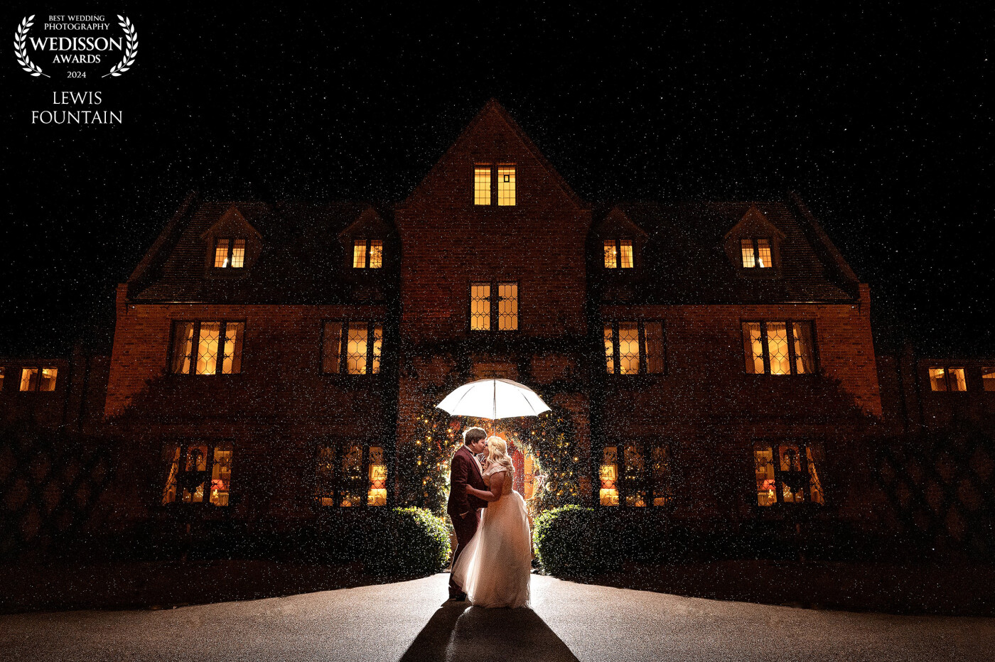 A Christmas wedding to remember.<br />
Jackie and Chris were only to keen to brave the wind and rain to grab this shot in front of the Old Hall, Ely