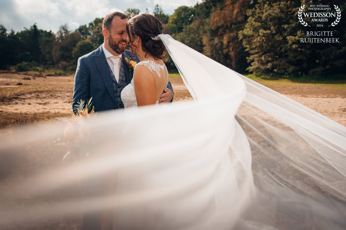 "The wedding of Saskia and Bram took place on a beautiful day in September. I love lifestyle photography and am always curious about what will happen. And then the wind took over..."