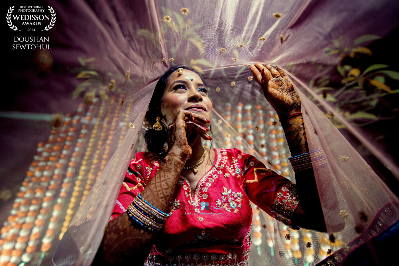 The rituals of Hindu weddings in Mauritius are so colourful  and enchanting. This picture was taken during the mehendi night when the background was not so inspiring though. However, being creative I was able to capture this sweet image of the beautiful bride. <br />
<br />
It was an amazing feeling when she saw the results.