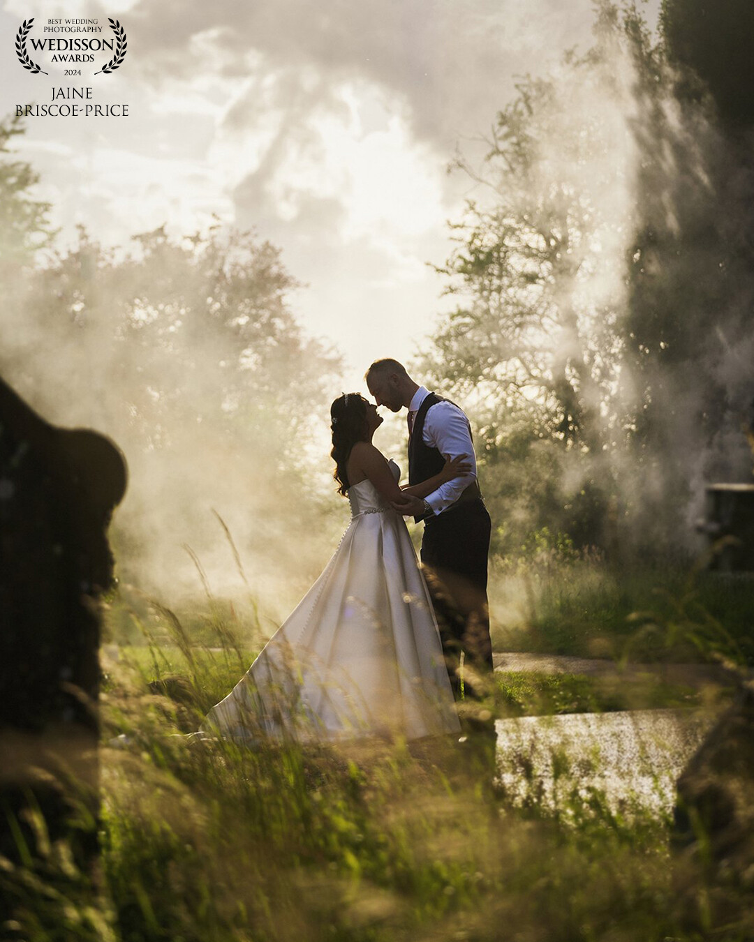 This was a wedding with a lovely church then a "difficult" church hall for imagery... thank goodness it didn't rain, instead we had this lovely late afternoon sun mixed with a smoke bomb for atmosphere.