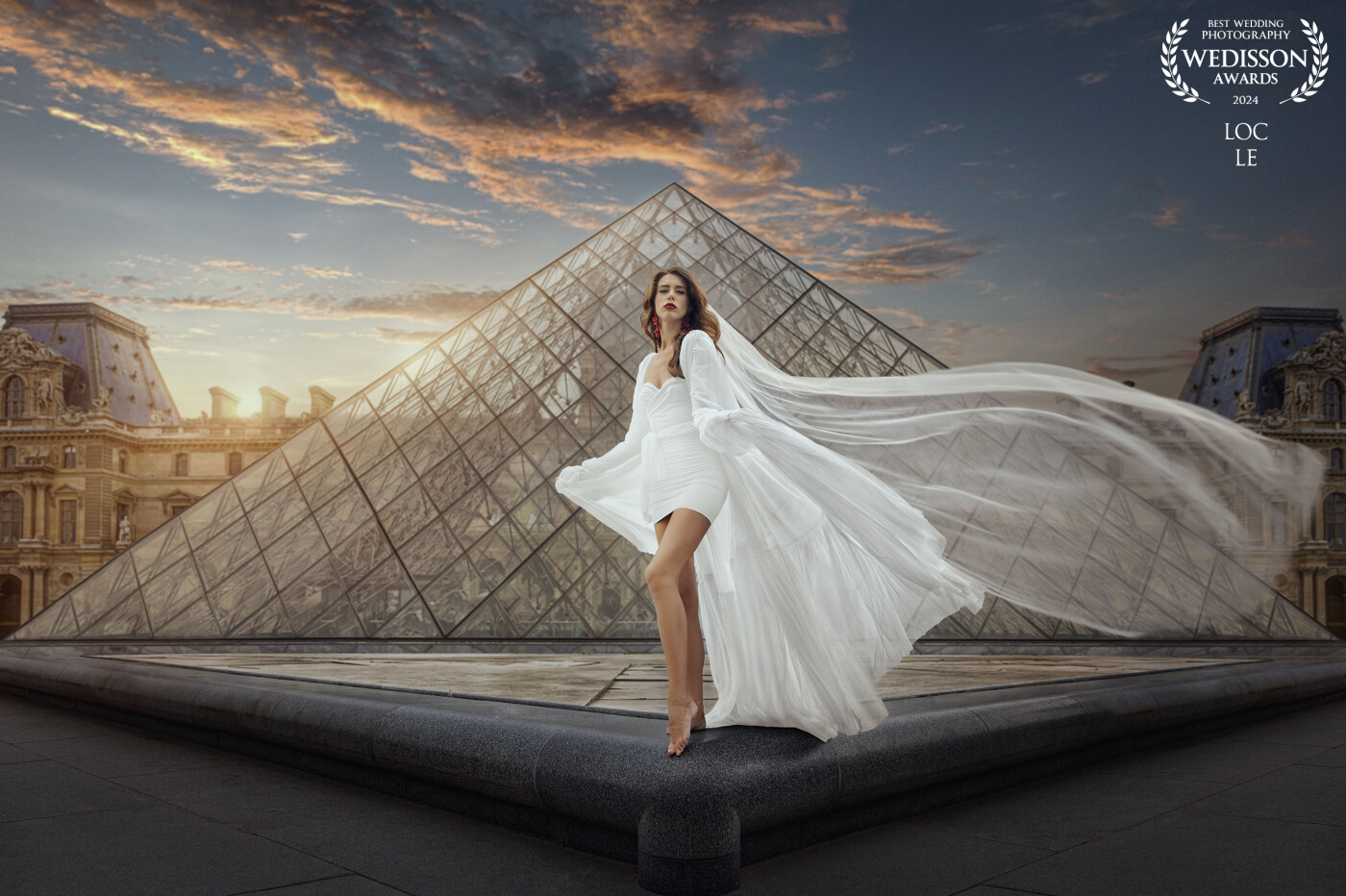 Taken in front of the Louvre Museum,  our beautiful bride graced the heart of Paris with her timeless beauty.