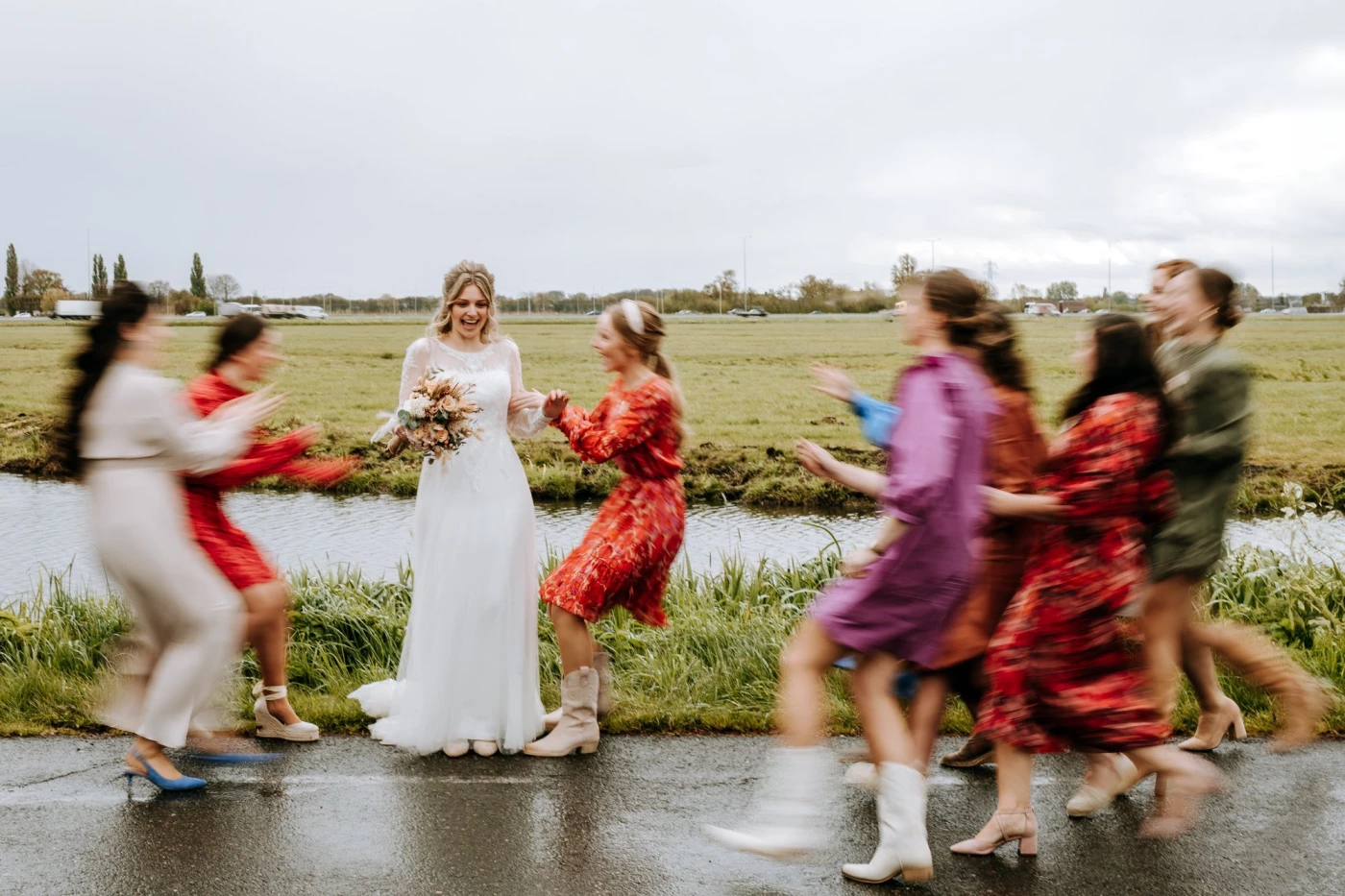 When it was time to make some photos of the bride with her friends, the rain had just stopped, so we...