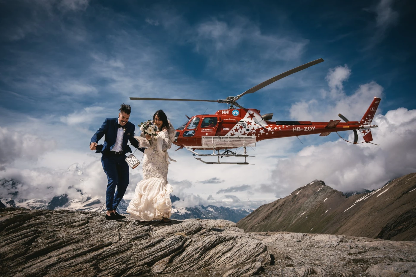 Against the majestic backdrop of the Swiss Alps, this adventurous couple made a thrilling entrance v...