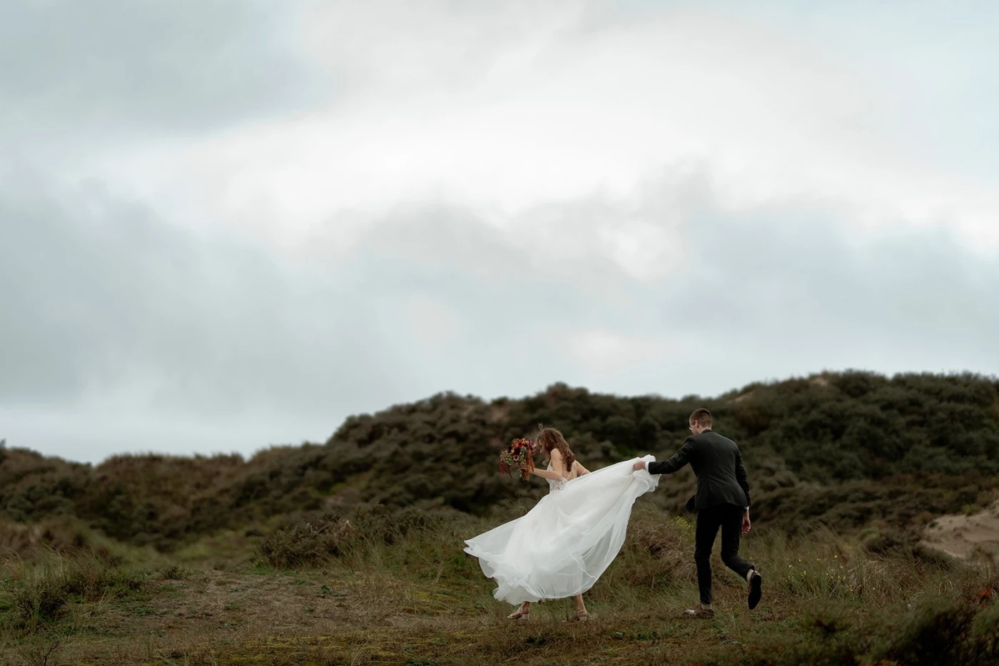 A one hour break in between a wet and windy day gave us the perfect moody shots during L & N’s  wedd...