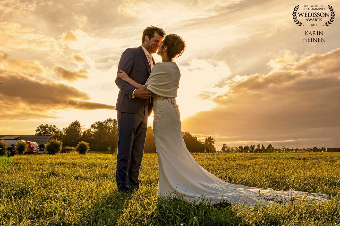 After a challenging day with heavy rain and stormy wind this great couple's outdoor wedding turned out to have a benevolent gold and silver lining. We were delighted P & A were still in the mood for some final shots during the start of the evening. While over 200 guests started coming in we took this golden shot.
