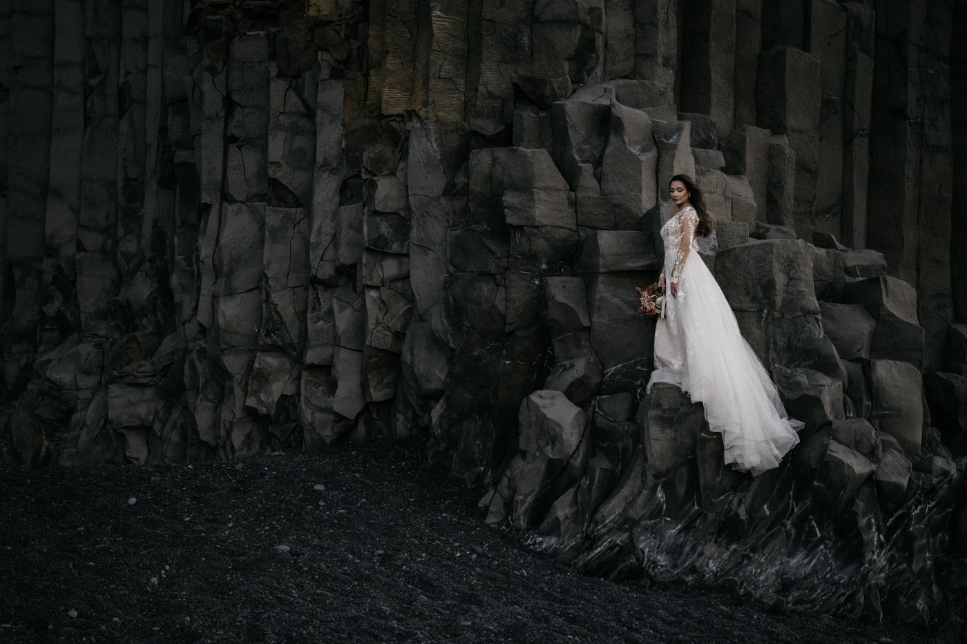 Black Beach—where the wild winds whisper vows, and the dark sands cradle timeless love.