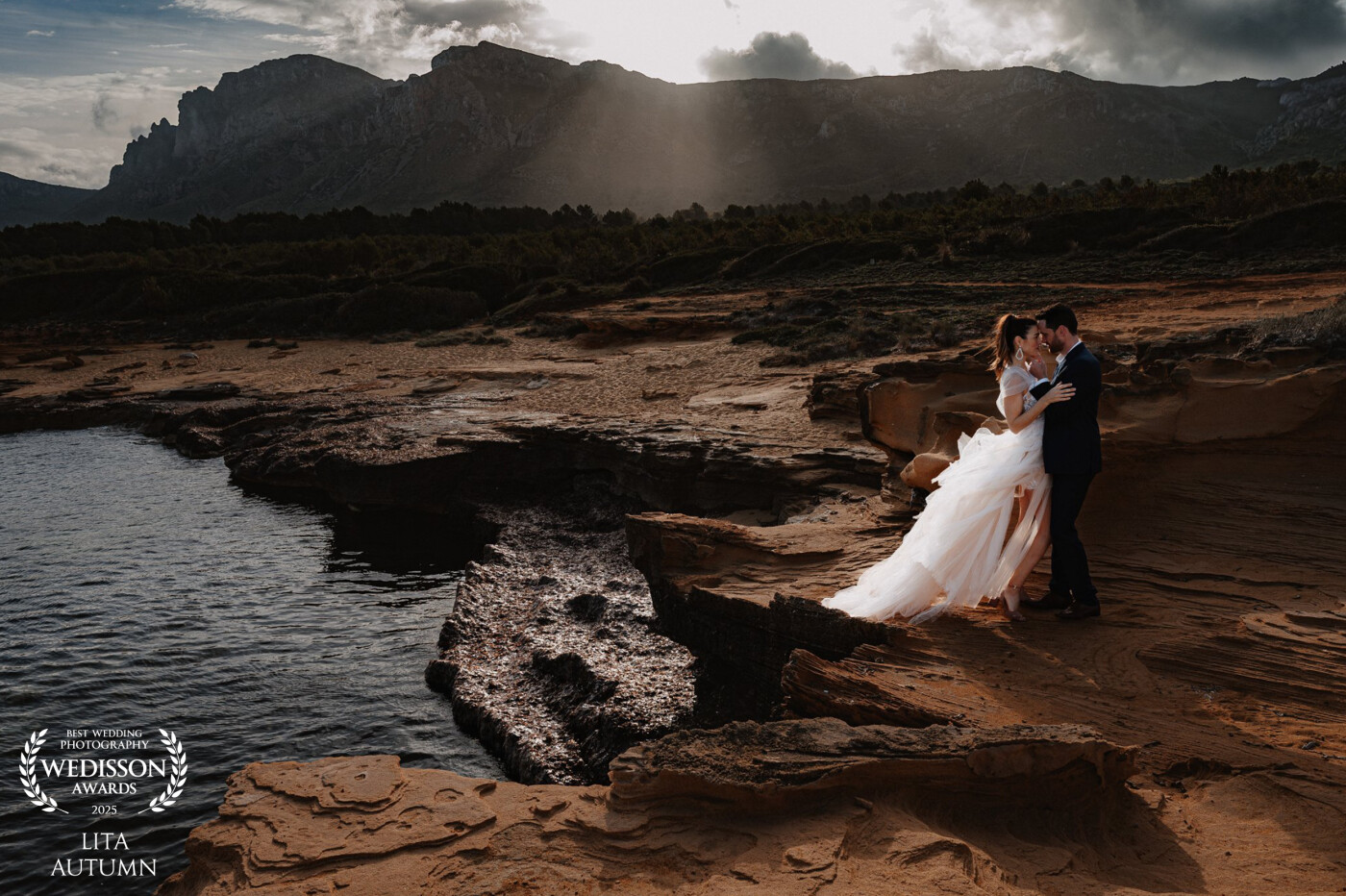 The sun began to shoot through the clouds. <br />
It was a perfect sunrise, a magical scene, and one we will never forget. <br />
- Mallorca Island.