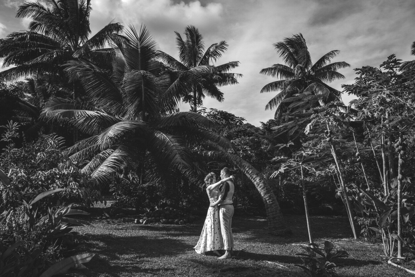 Destination wedding dreams: Dancing barefoot beneath the palms and papaya trees.