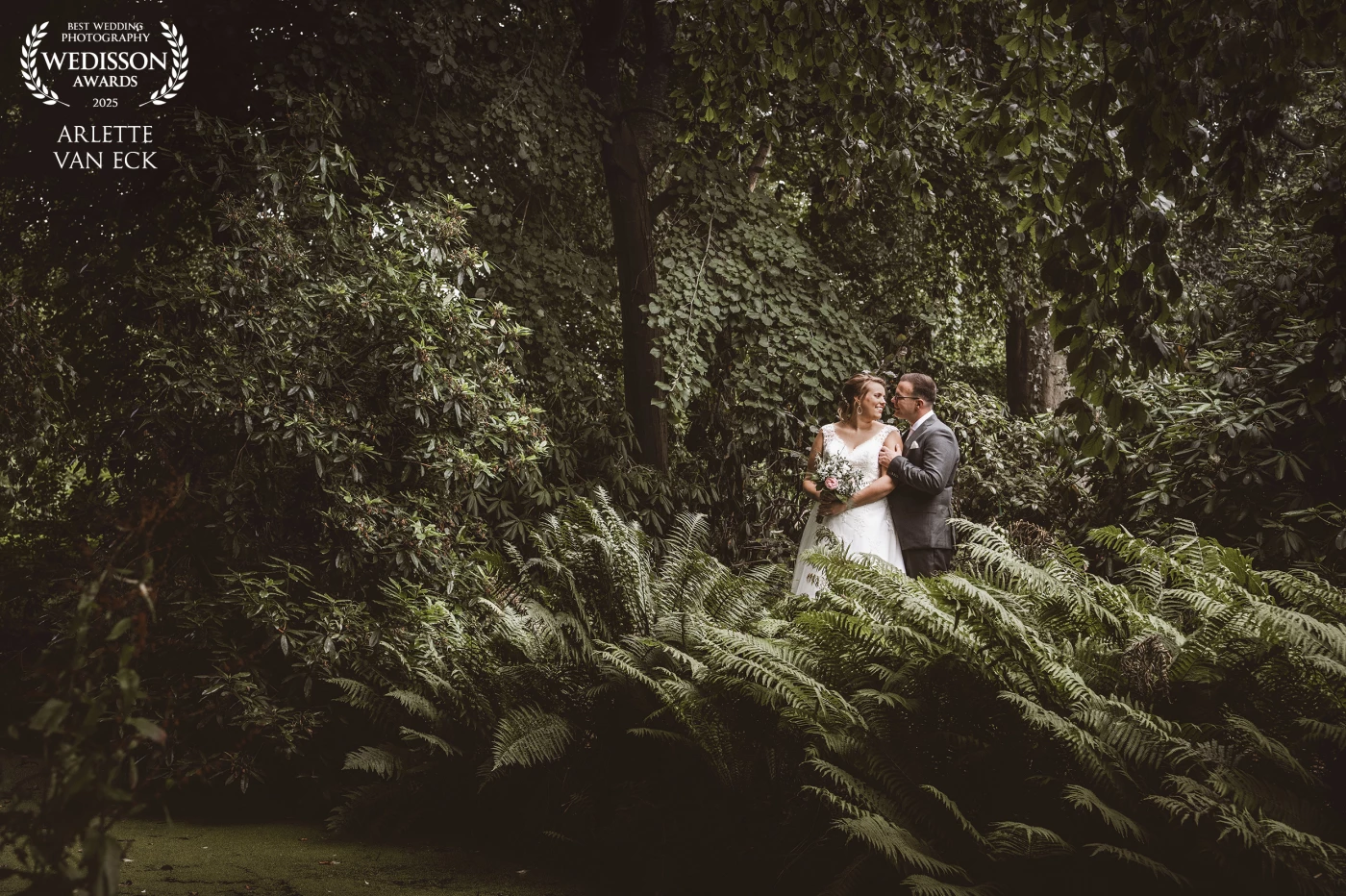 Some places are more than just beautiful... For the bride and groom, the fern plant has a special meaning. So what could be more beautiful than being together in the greenery, surrounded by exactly that plant that means so much to them.<br />
<br />
Not only my favorite photo, but also of my bride and groom.