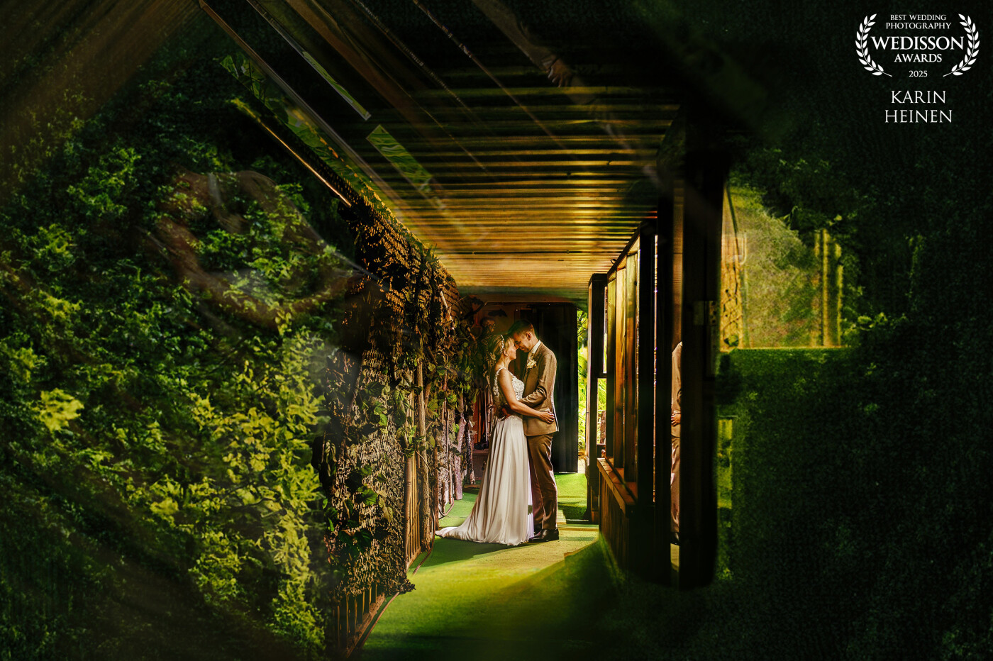 With rain pouring outside during the two 'shoot hours' this sweet couple selected a renowned Butterfly House in the Dutch Green Heartland as a back up. We're glad they did. Through this double layer looking glass we caught them in double perspective, since a reflection of the couple can be seen in the upper left. A great thanks to Wedisson for this recognition!