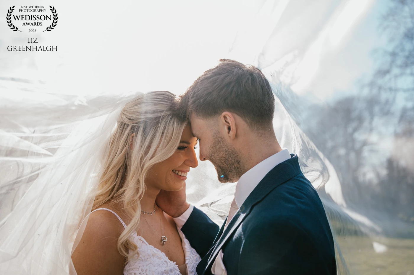 Who doesn't love a veil photo? The sun was shining through and it was the perfect moment to capture the new Mr & Mrs