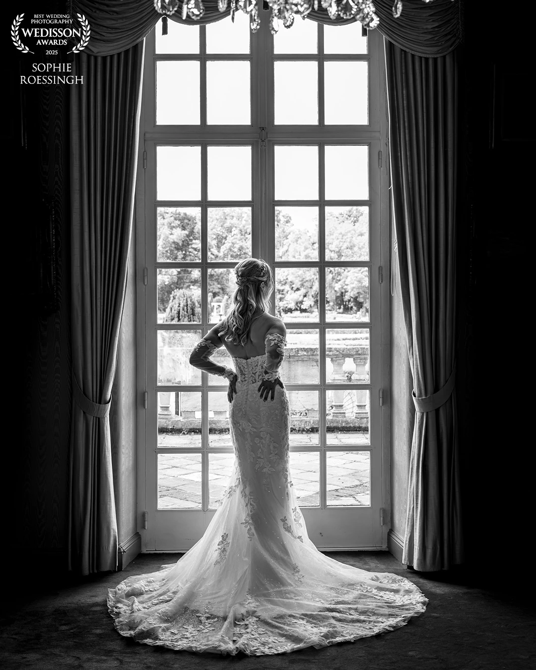 This is truly a perfect location for a romantic wedding. She looks absolutely stunning and fits beautifully into the elegant atmosphere of this lovely castle.