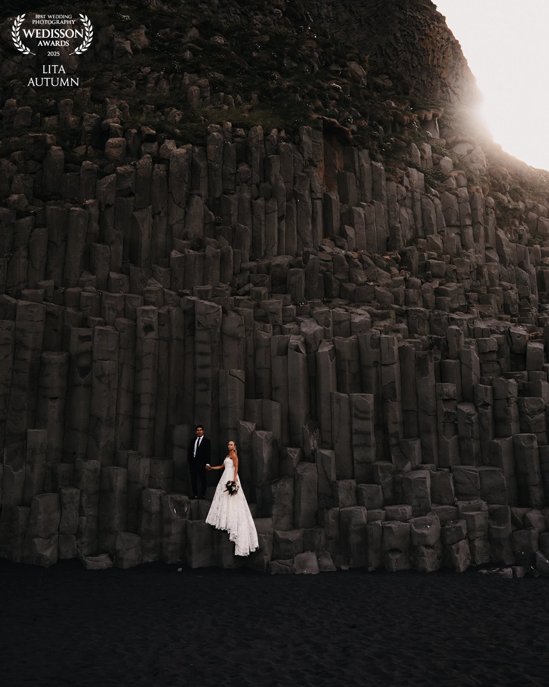 In the mystical landscapes of Iceland, where nature's raw beauty captivates the soul, a black beach stretches along the coastline, its dark sands a striking contrast against the vibrant hues of the ocean. Towering high mountains stand sentinel over this enchanting scene, their peaks often shrouded in mist, creating an aura of mystery and wonder.<br />
<br />
“I vow to journey with you,” one begins, their voice steady yet filled with emotion, “to explore the world and build a life filled with passion and adventure.”<br />
<br />
“With you,” the other responds, “I am home. I promise to create memories that will last a lifetime, to stand by your side through every high and low, just like these mountains that witness our love today.”